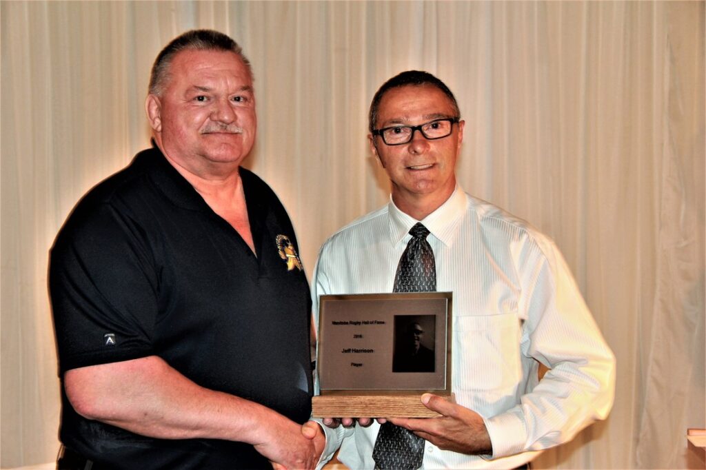 Rick Romsa presenting to Jeff Harrison (L-R: Rich Romsa, Jeff Harrison)